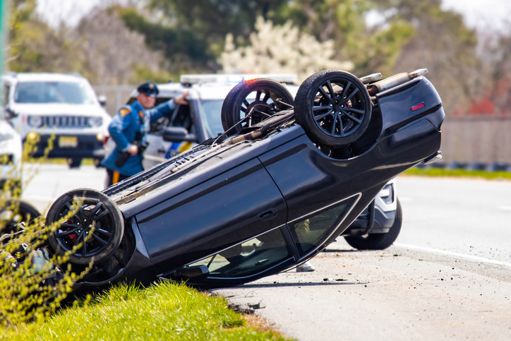 vehicle rollover highway road accident with police